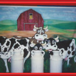 Carnival event Milk jugs with a cow background
