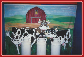 Carnival event Milk jugs with a cow background