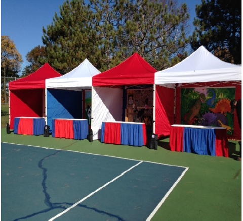 Outdoor carnival event red and white tents